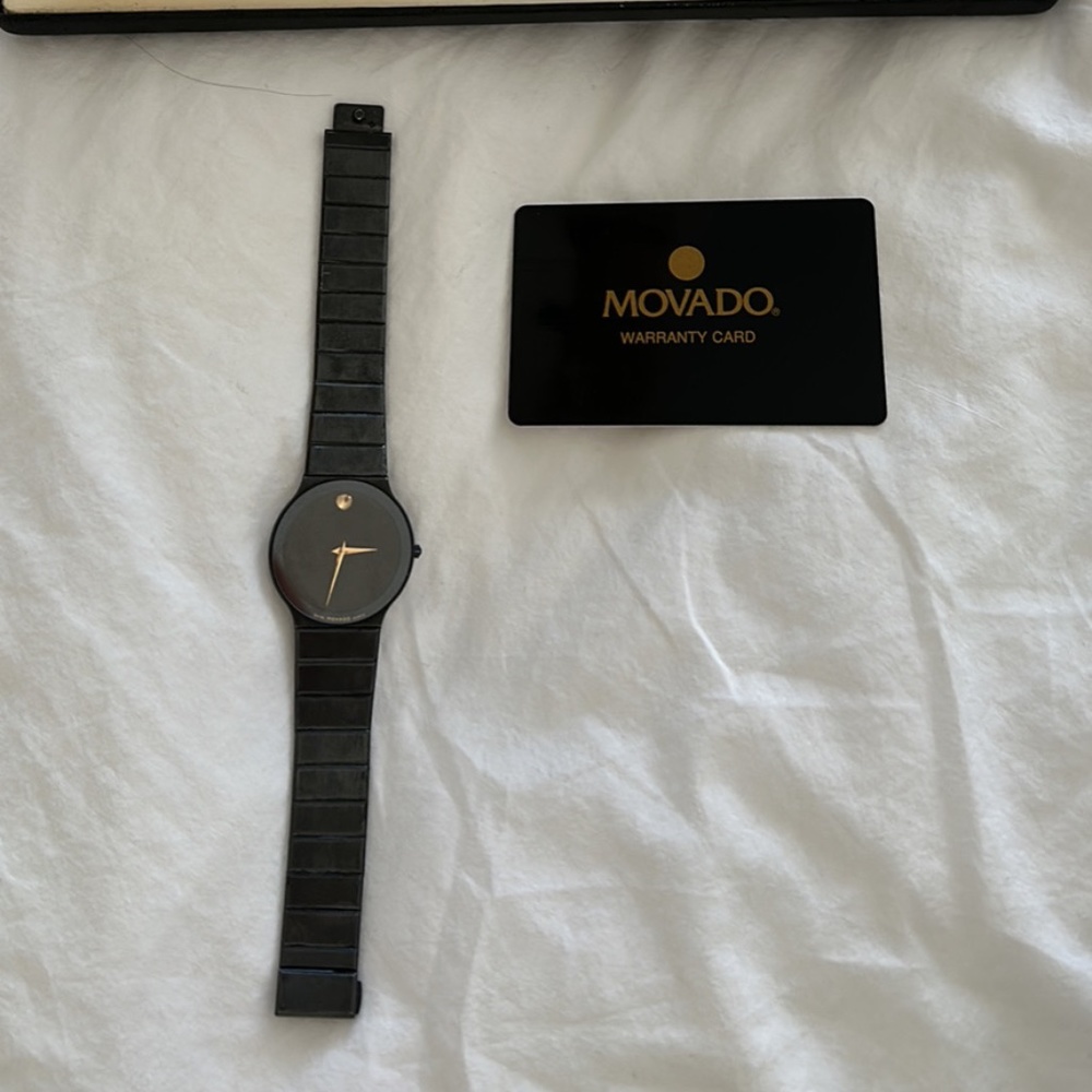 Movado watch- black faced with black chain strap